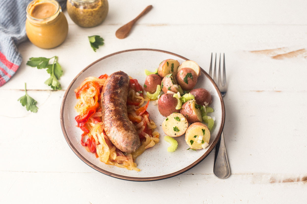Beer Simmered Brats with Peppers and Onions | Cook Smarts